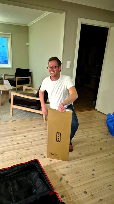 Robert Hammond assembling the flatpack trolley in Kristiansand - the open suitcase in shot did not end up agreeing